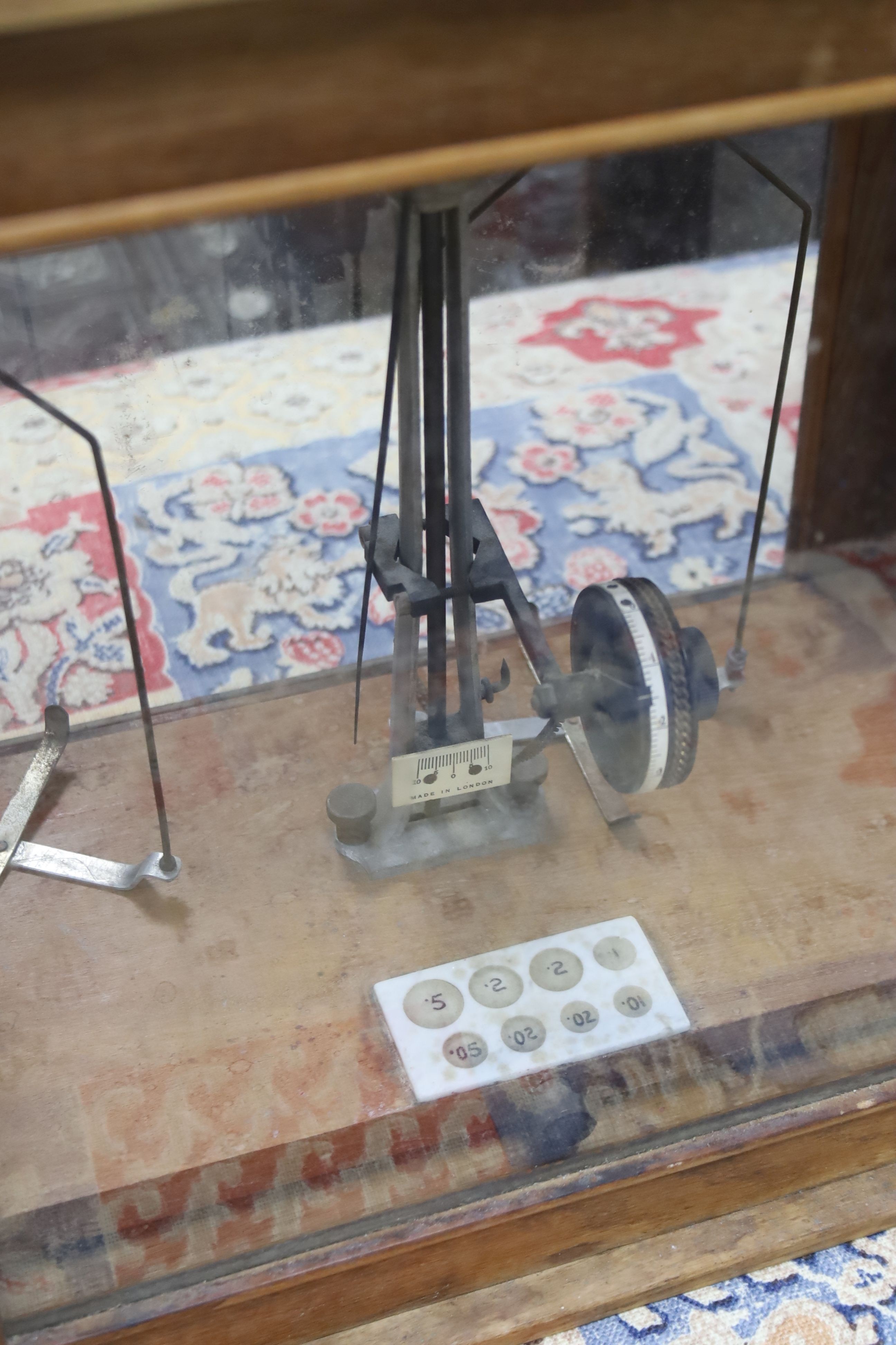 A set of cased postage scales